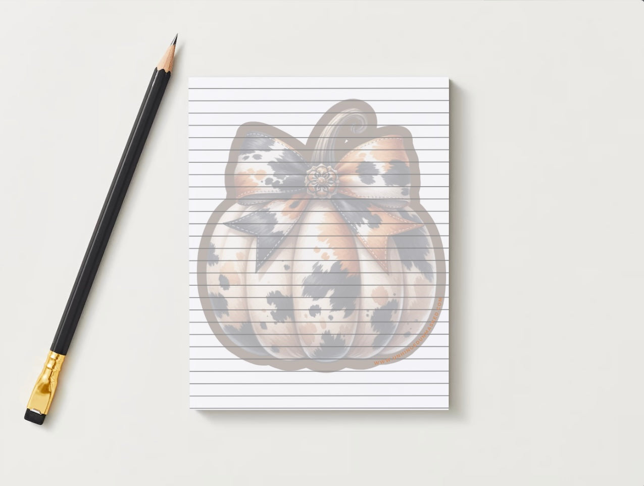 Cow print pumpkin lined note pad